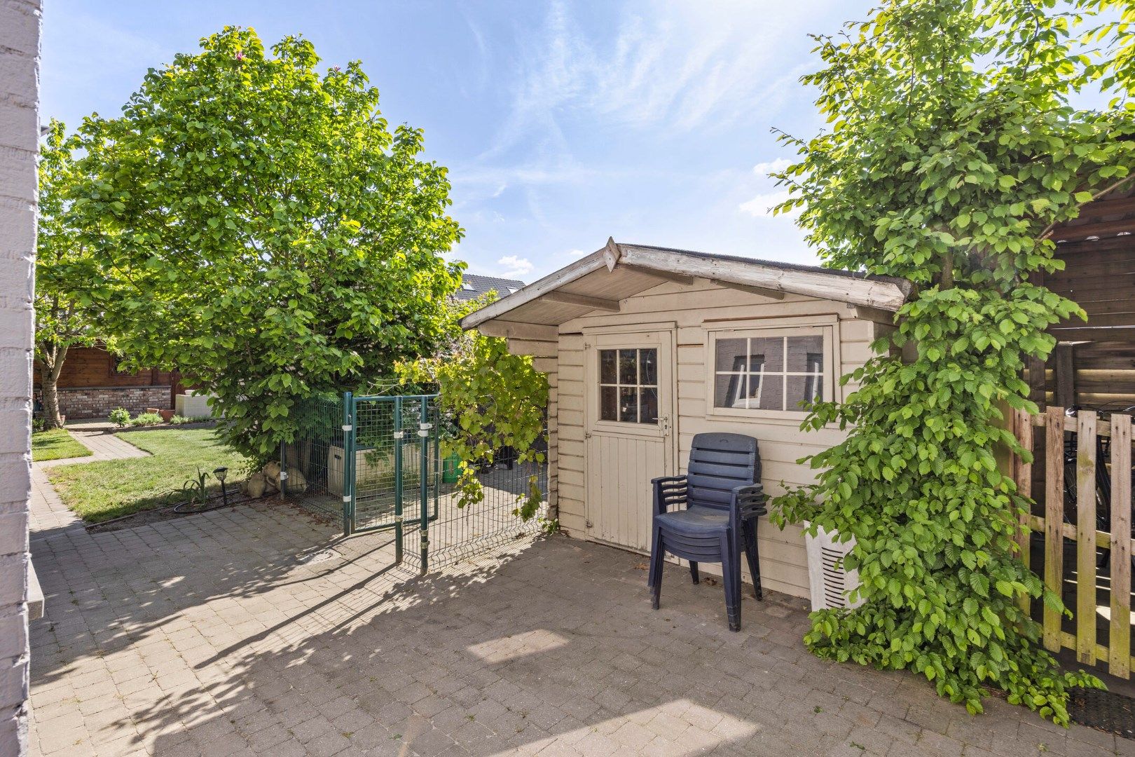 Instapklare woning met 3 SLPKS en zon georiënteerde tuin !  foto 33