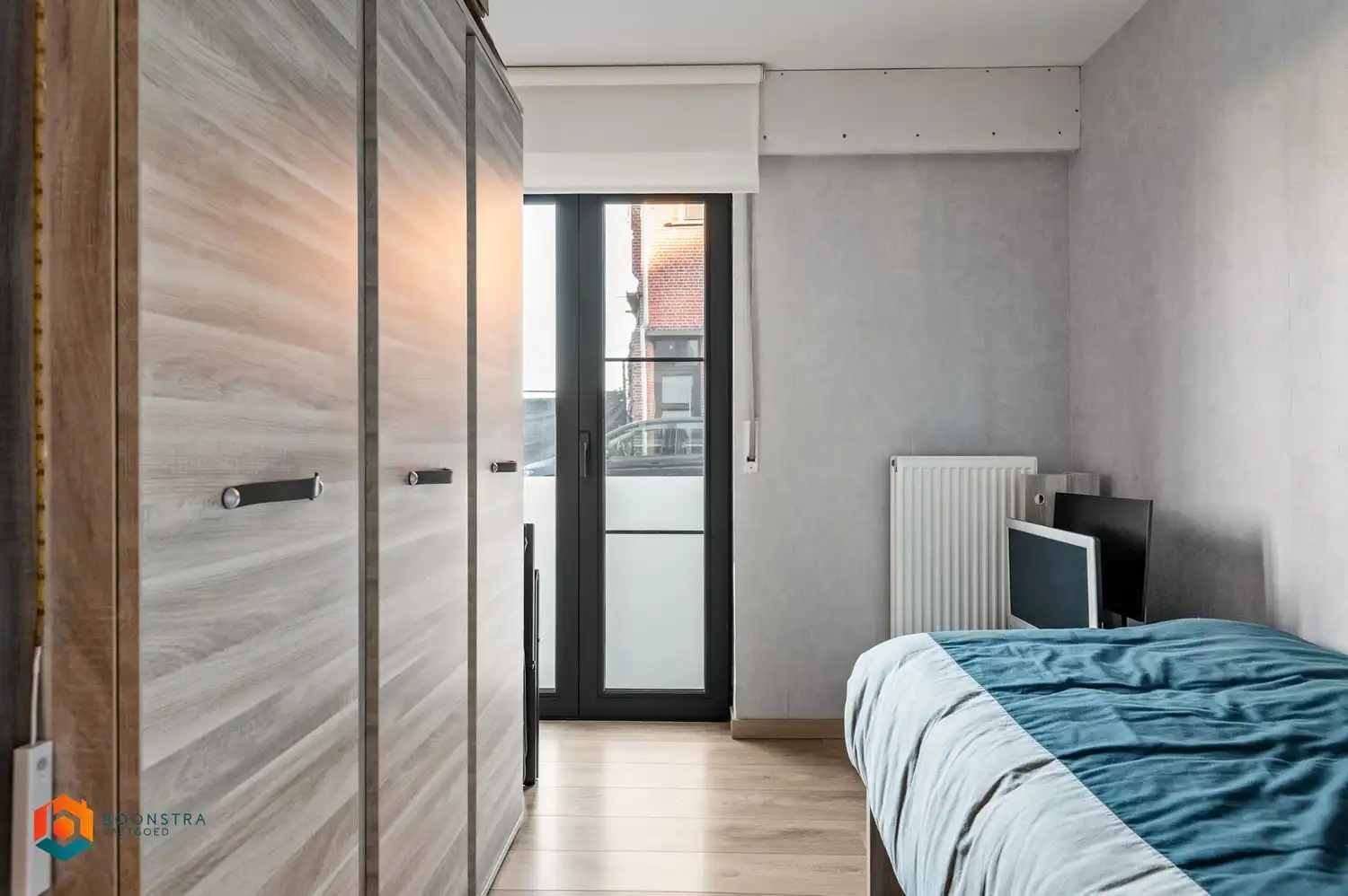 Instapklaar gelijkvloers appartement met 2slpkrs en tuin foto 14