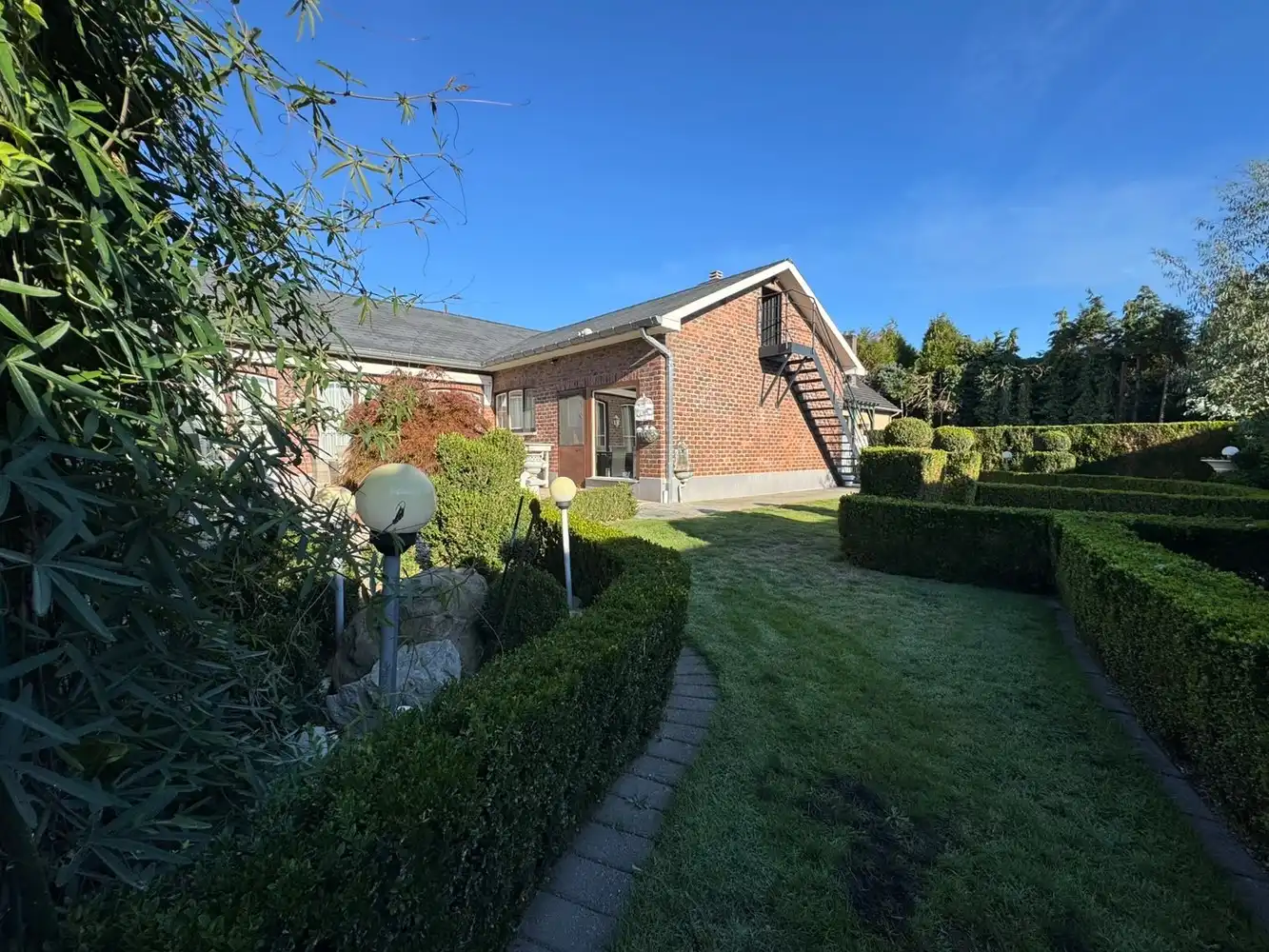 Gelijkvloerse gezinswoning met verzorgde tuin te Zonhoven foto 14