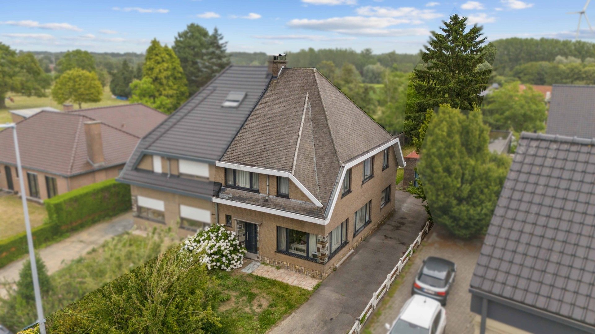 Halfopen gezinswoning in het hart van het landelijke Gontrode, met zicht op agrarisch gebied foto 22