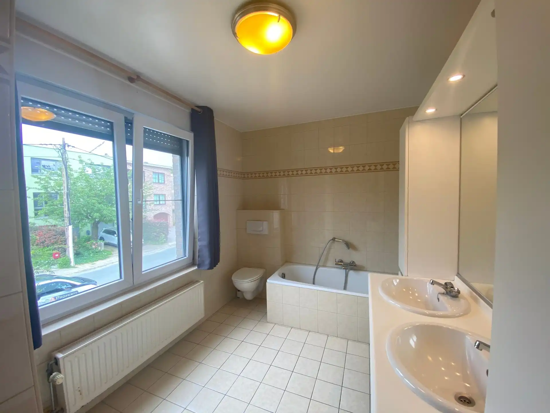 Ruime en lichtrijke woning met aangename west-geörienteerde tuin, gelegen in een rustige en doodlopende straat op wandelafstand van het centrum van Kortenberg. foto 10
