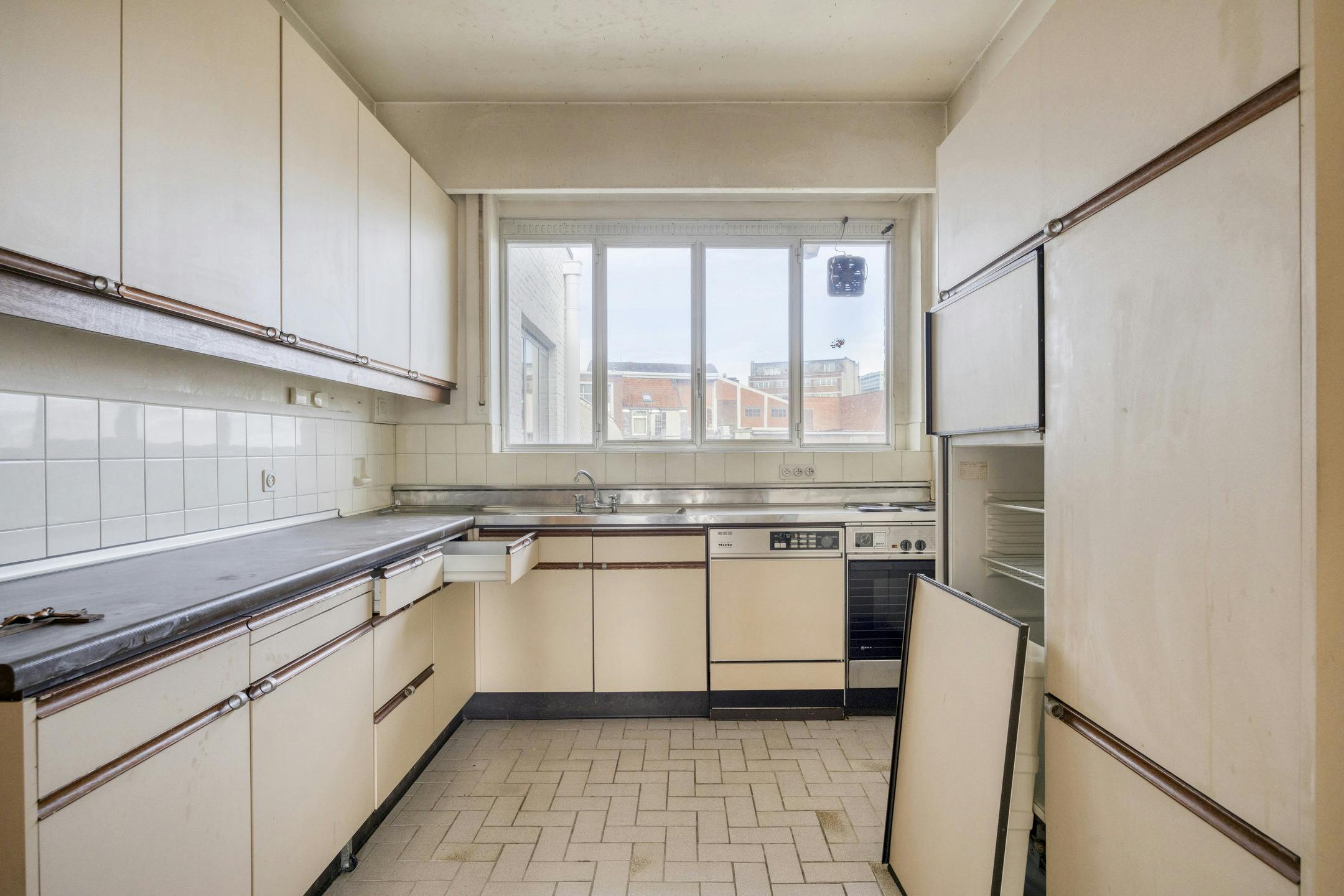 Te renoveren opbrengsteigendom met 3 appartementen en handelspand in Antwerpen foto 33