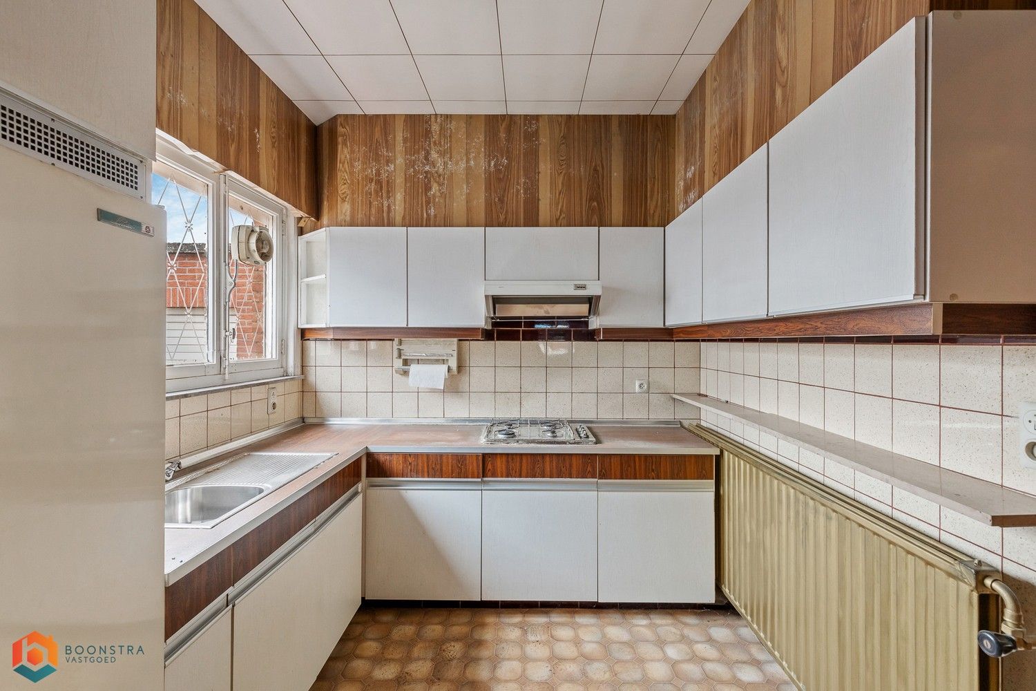 Te renoveren woning met tuin en 2 slpkrs op een perceel van 664 m² foto 8