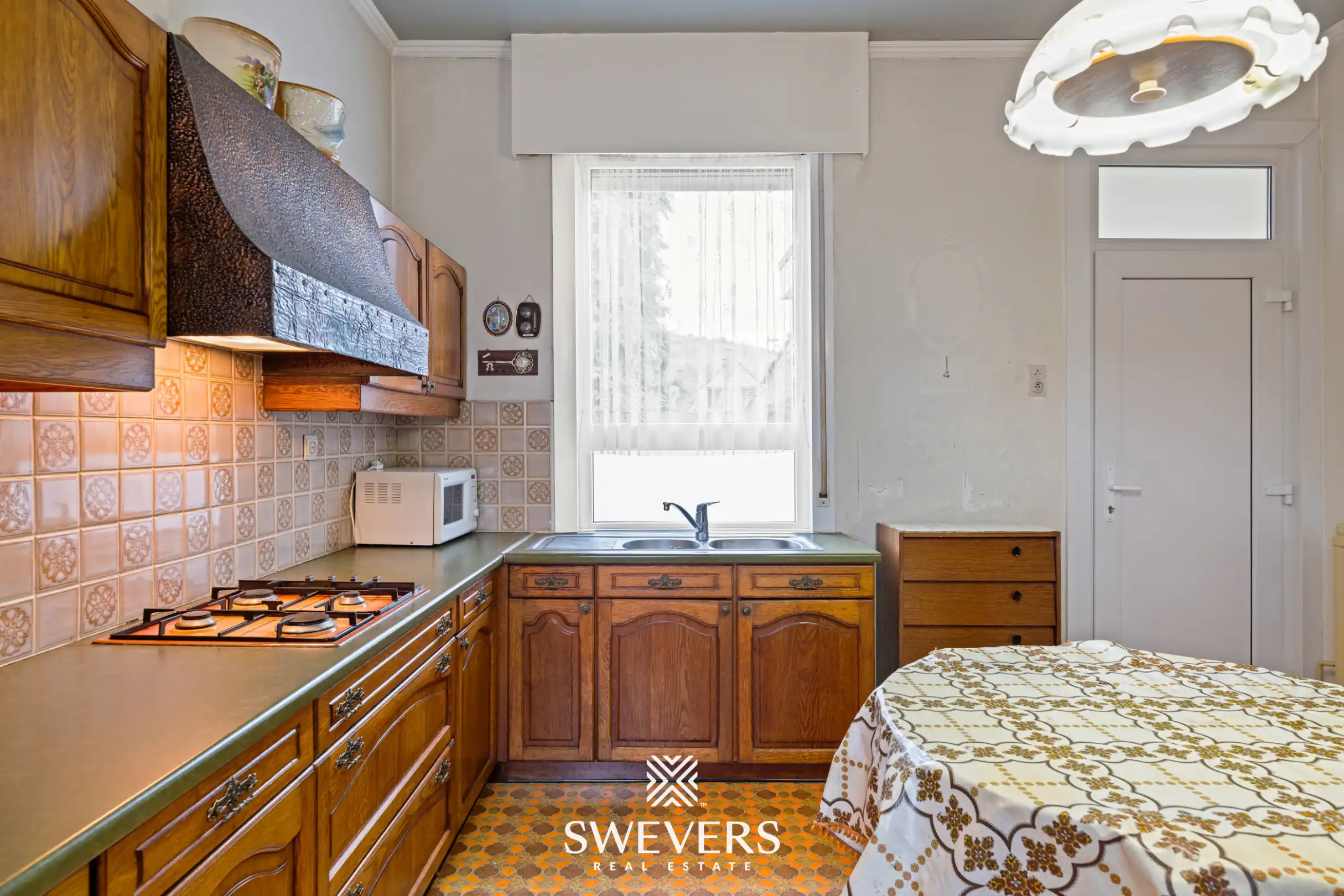 Gezellige halfopen bebouwing toe aan renovatie met mogelijks 3 slaapkamers te Koersel foto 5