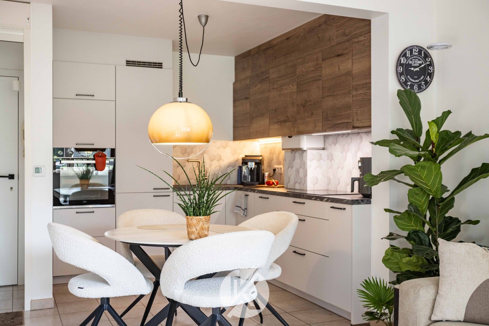 Smaakvol gelijkvloers appartement met tuin foto {{pictureIndex}}