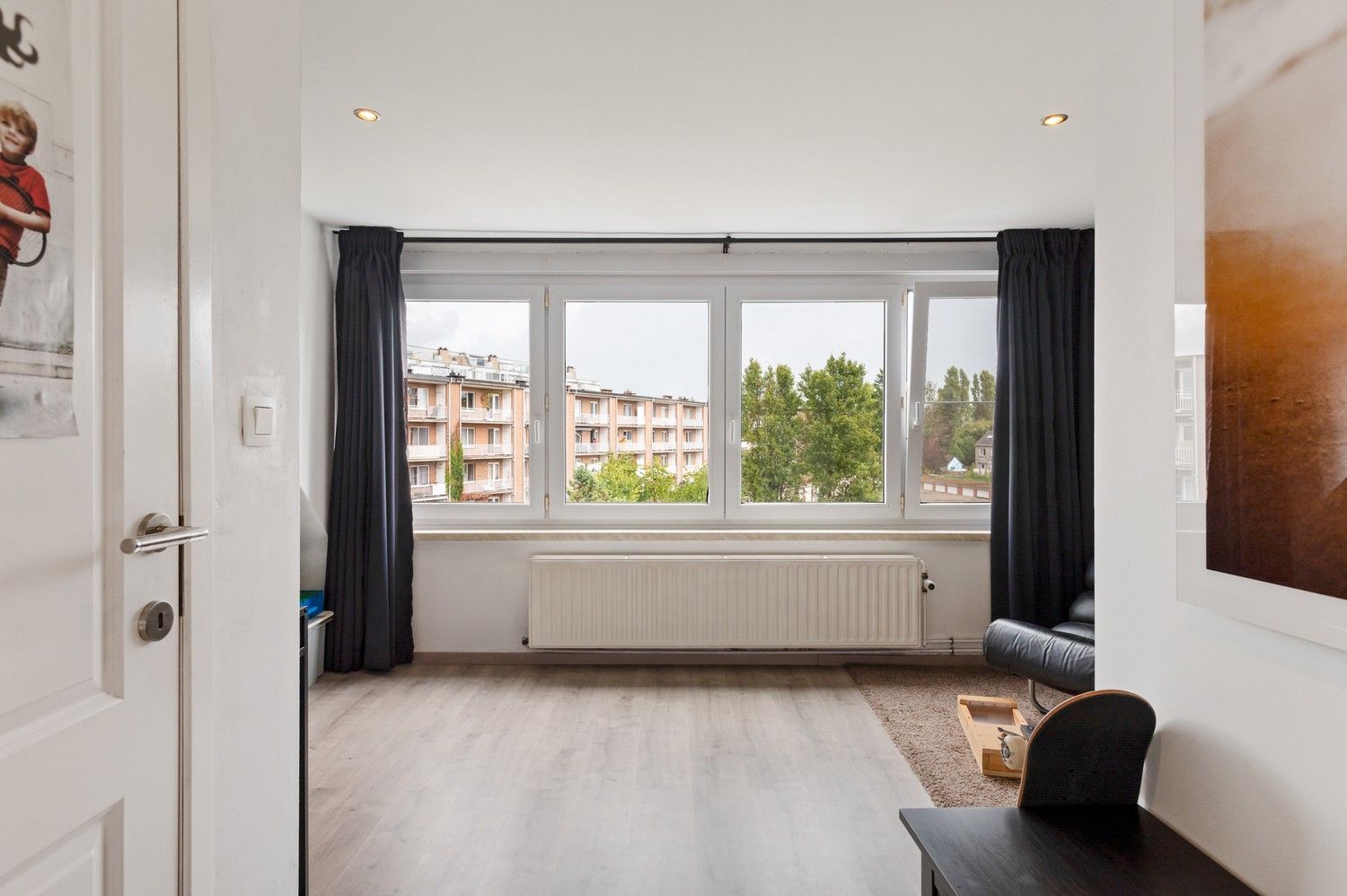 Instapklaar, ruim huis met 4 slaapkamers en tuin te koop in Schoten! foto 26