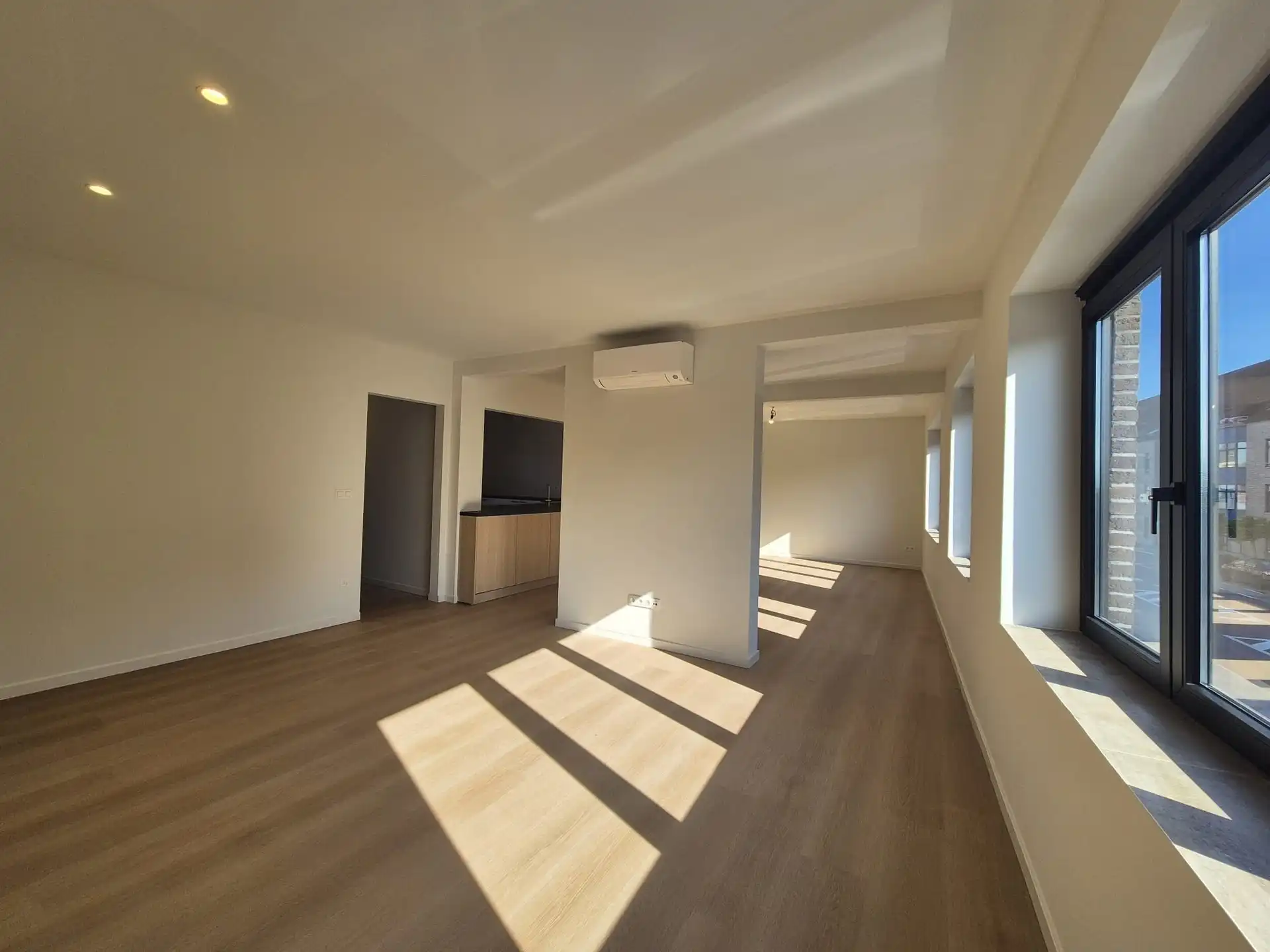 Ruim triplex appartement met polyvalente ruimte op toplocatie in het hart van Wetteren foto 7