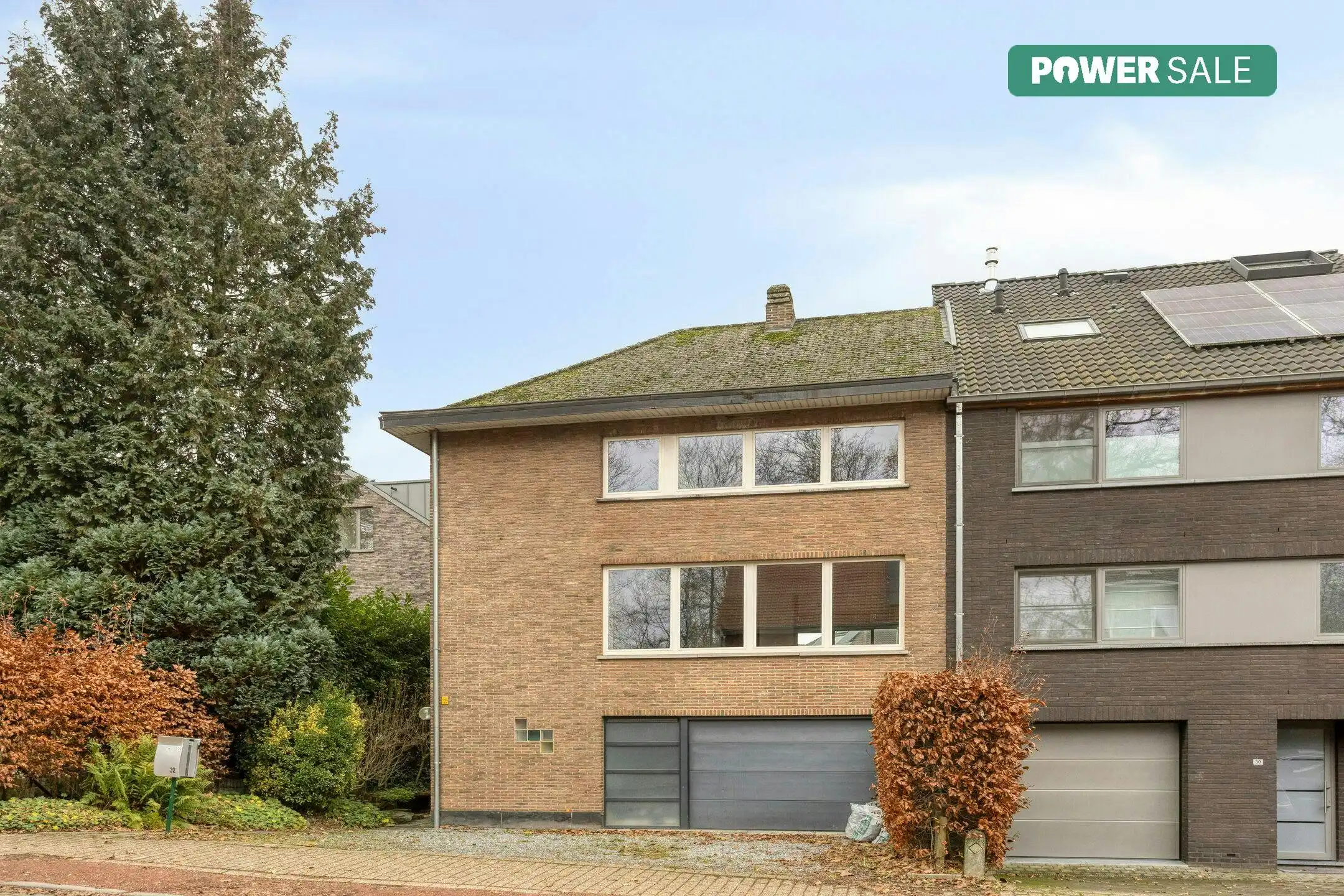 Driegevelwoning met extra studio/kantoor of praktijk, op een toplocatie in het centrum van Grimbergen! foto {{pictureIndex}}