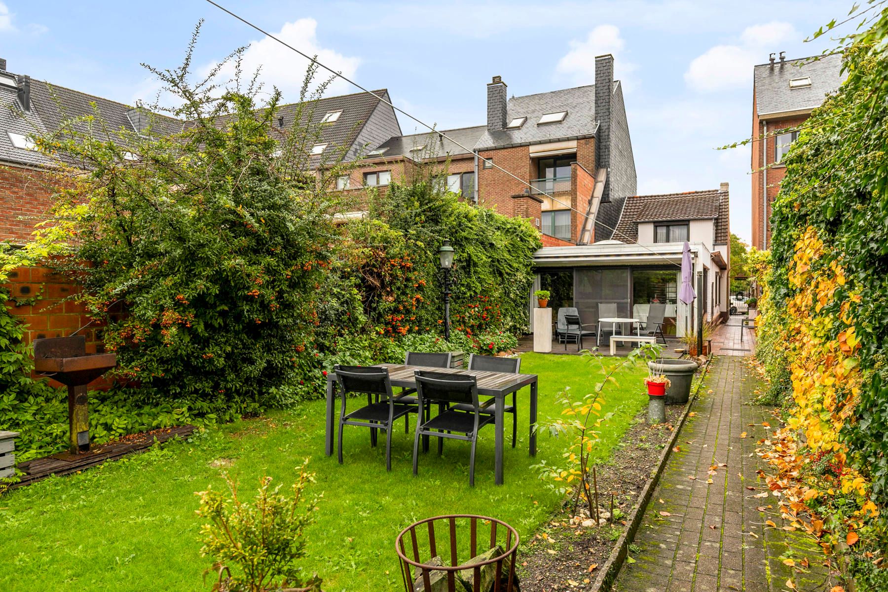 In de dorpskern van Neeroeteren gelegen halfvrijstaande woning met 2 slaapkamers. foto 25