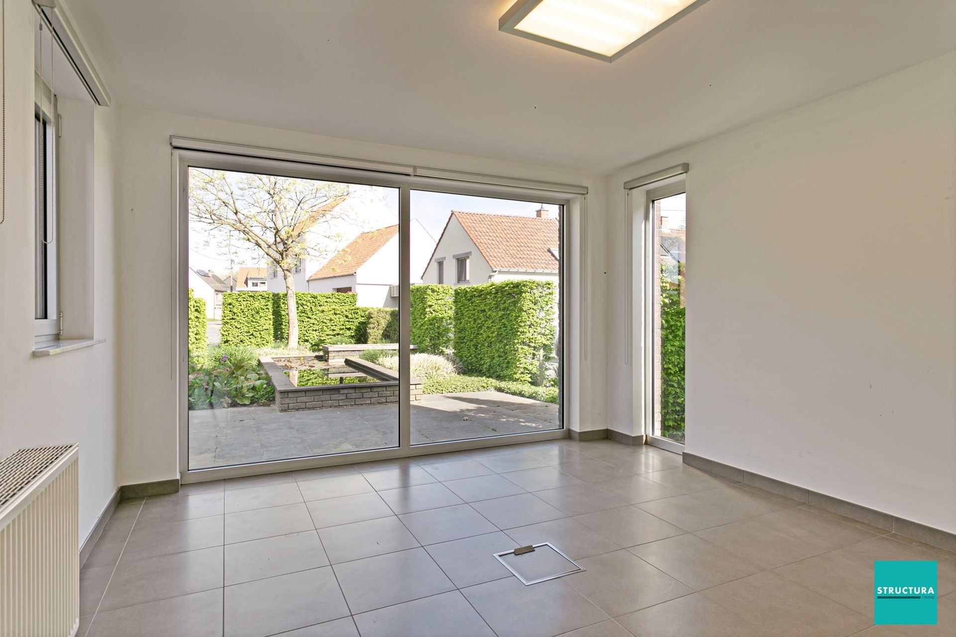 Woning met handelsgelijkvloers foto 11