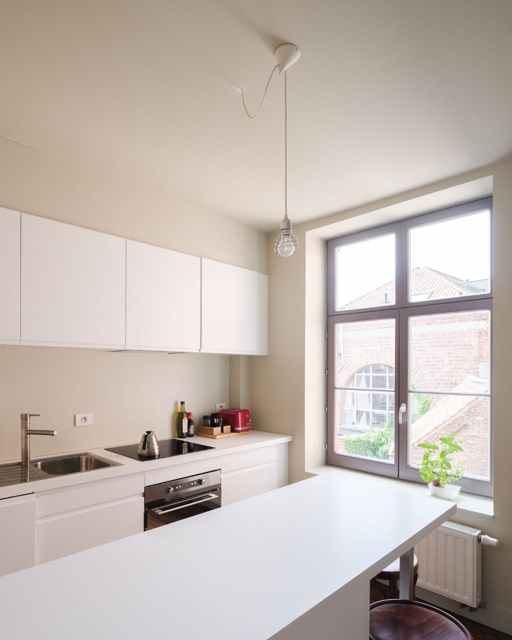 Karaktervol handelspand (restaurant + 2-slpk app) in het centrum van Gent foto 19