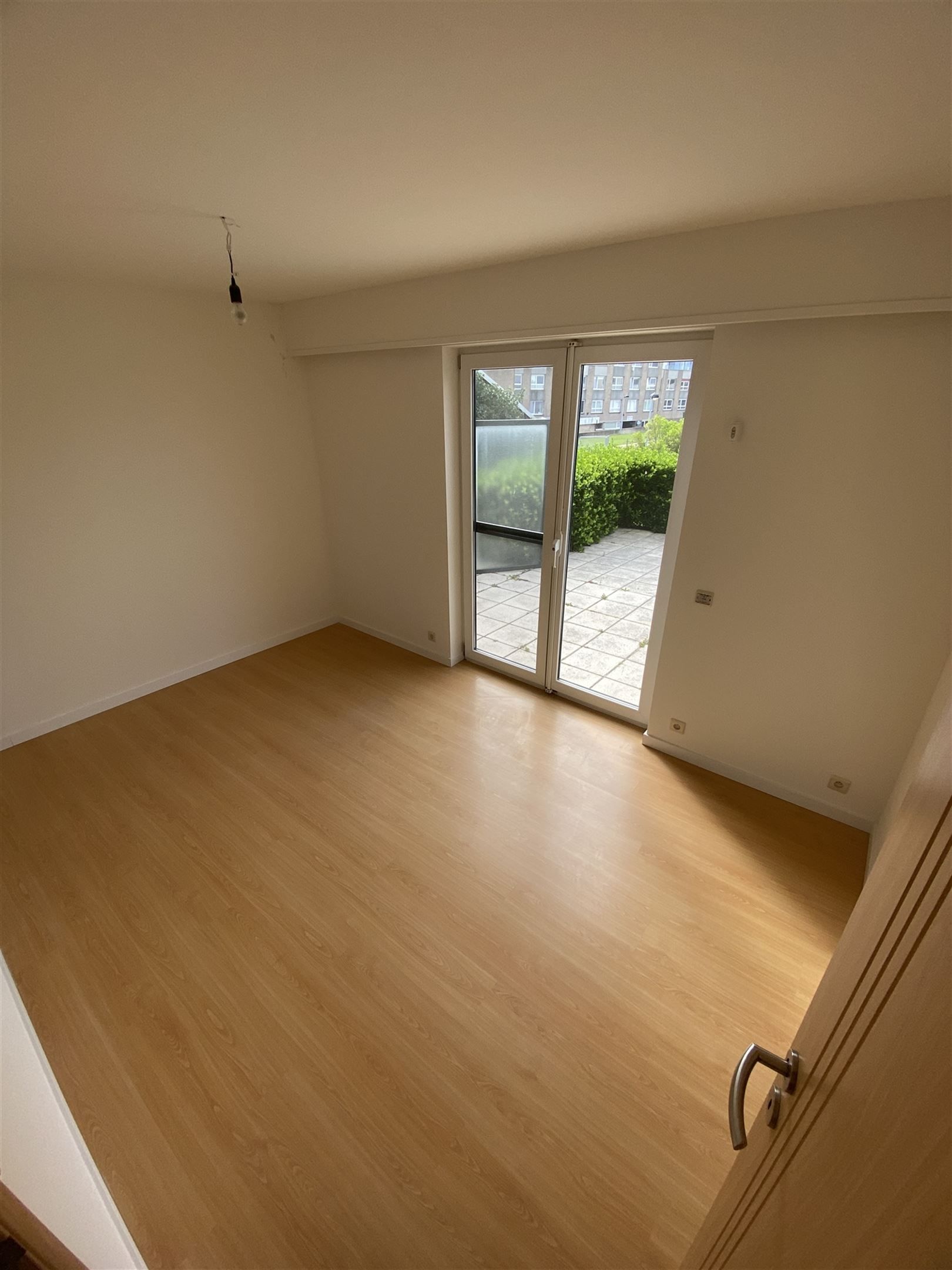 gelijkvloers appartement met garage foto 13