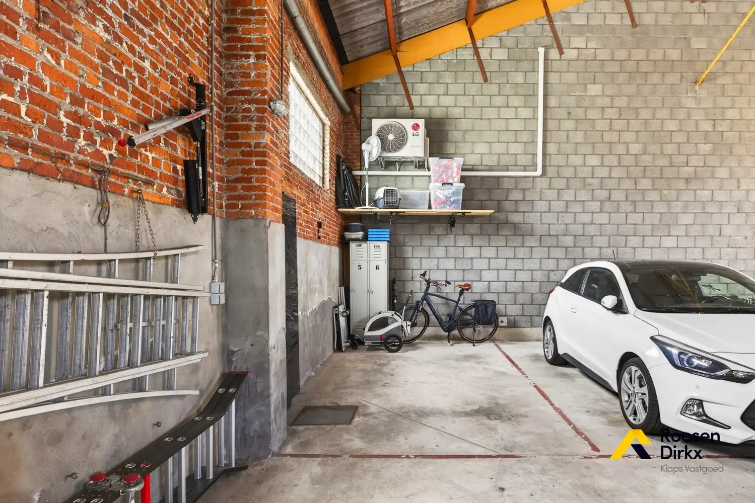 Unieke loft met overdekte autostaanplaats en 92m² bewoonbare oppervlakte in Bree centrum foto 24