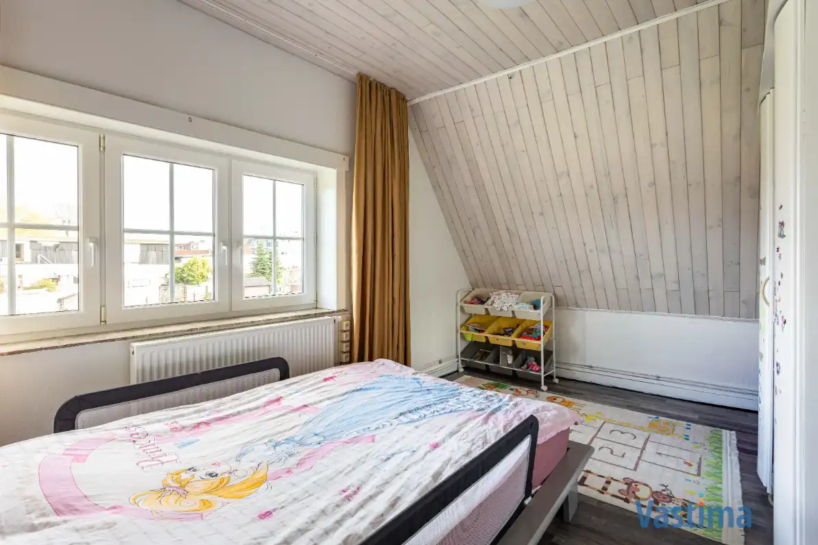 Rustig gelegen gezinswoning met tuin foto 13