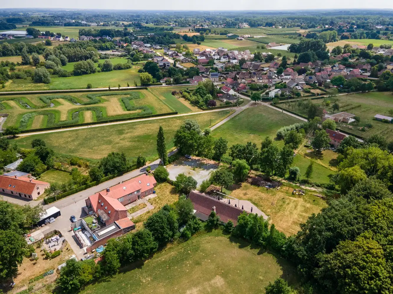 Landbouwgrond met gebouw op toplocatie in Emblem! foto 17