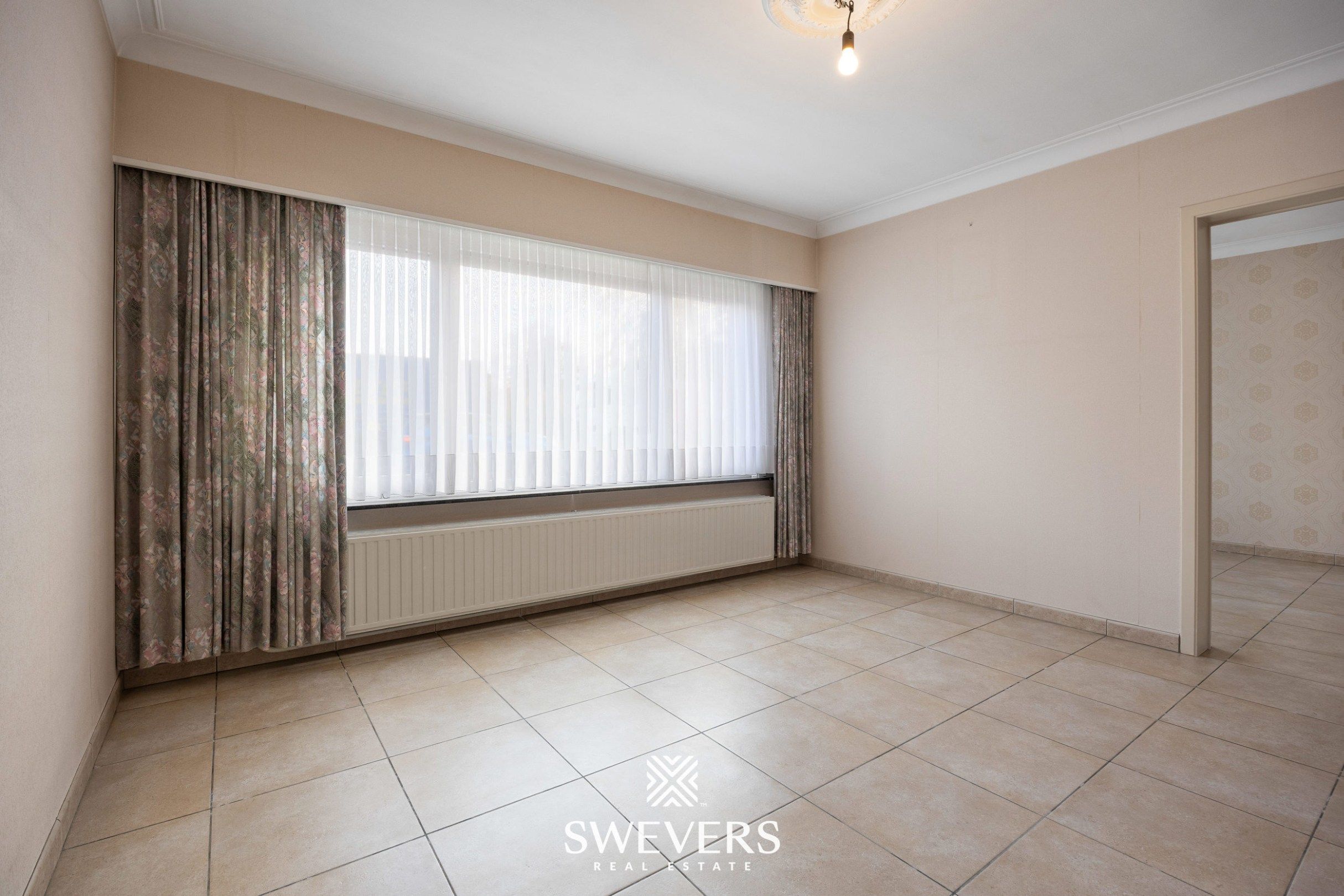 Te renoveren ruime gezinswoning met vijf slaapkamers en uitbreidingsmogelijkheden foto 6