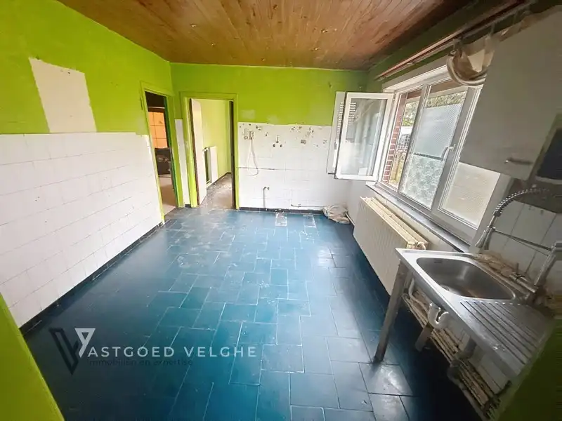 Te renoveren halfopen bebouwing met garage te koop in Maasmechelen (Boudewijnlaan) foto 11