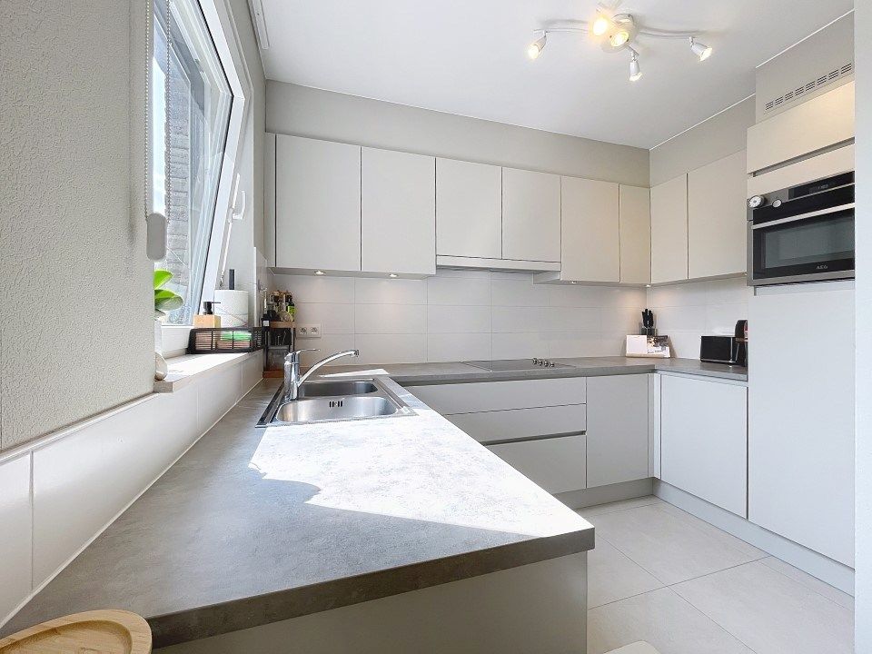 Ruim appartement met overdekte staanplaats op het marktplein van Staden, residentie Stoanplatse foto 5