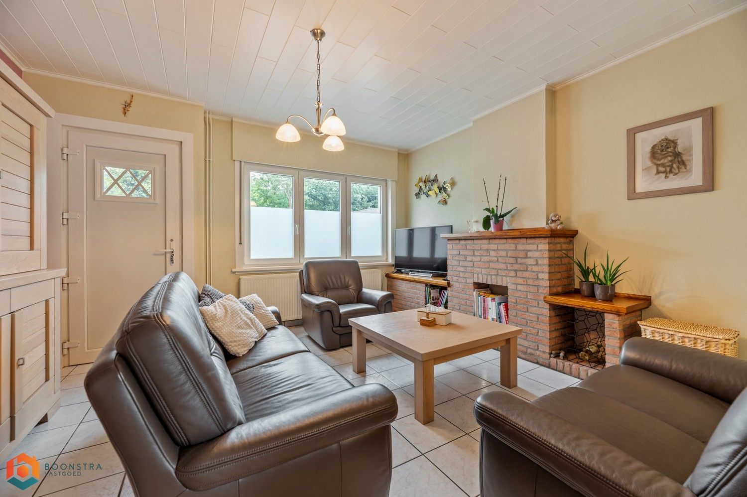 Verzorgde woning met 2 slpkrs, leuke tuin en garage foto 5