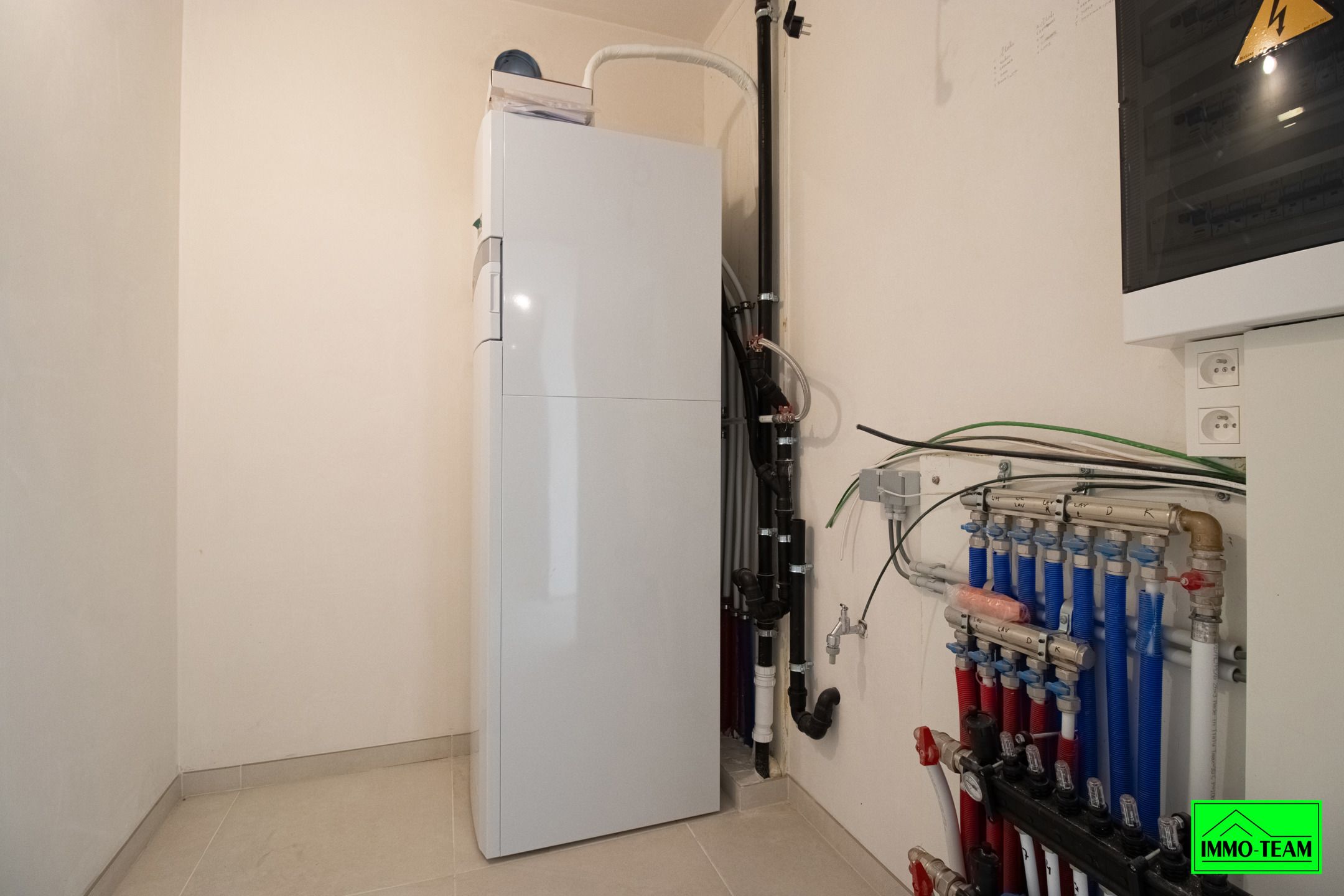 Nieuwbouw gelijkvloers appartement met terras en garage.  foto 16