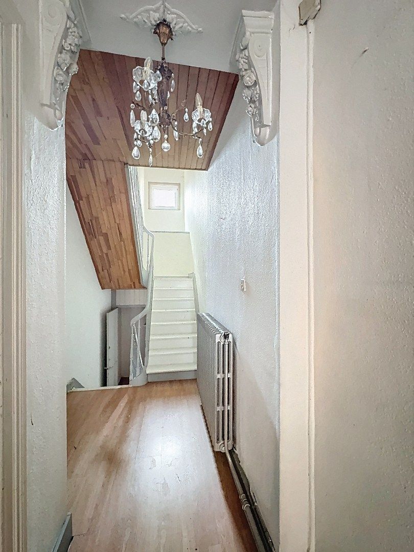 Charmant pand met handelsruimte en woonst in hartje Tienen foto 13