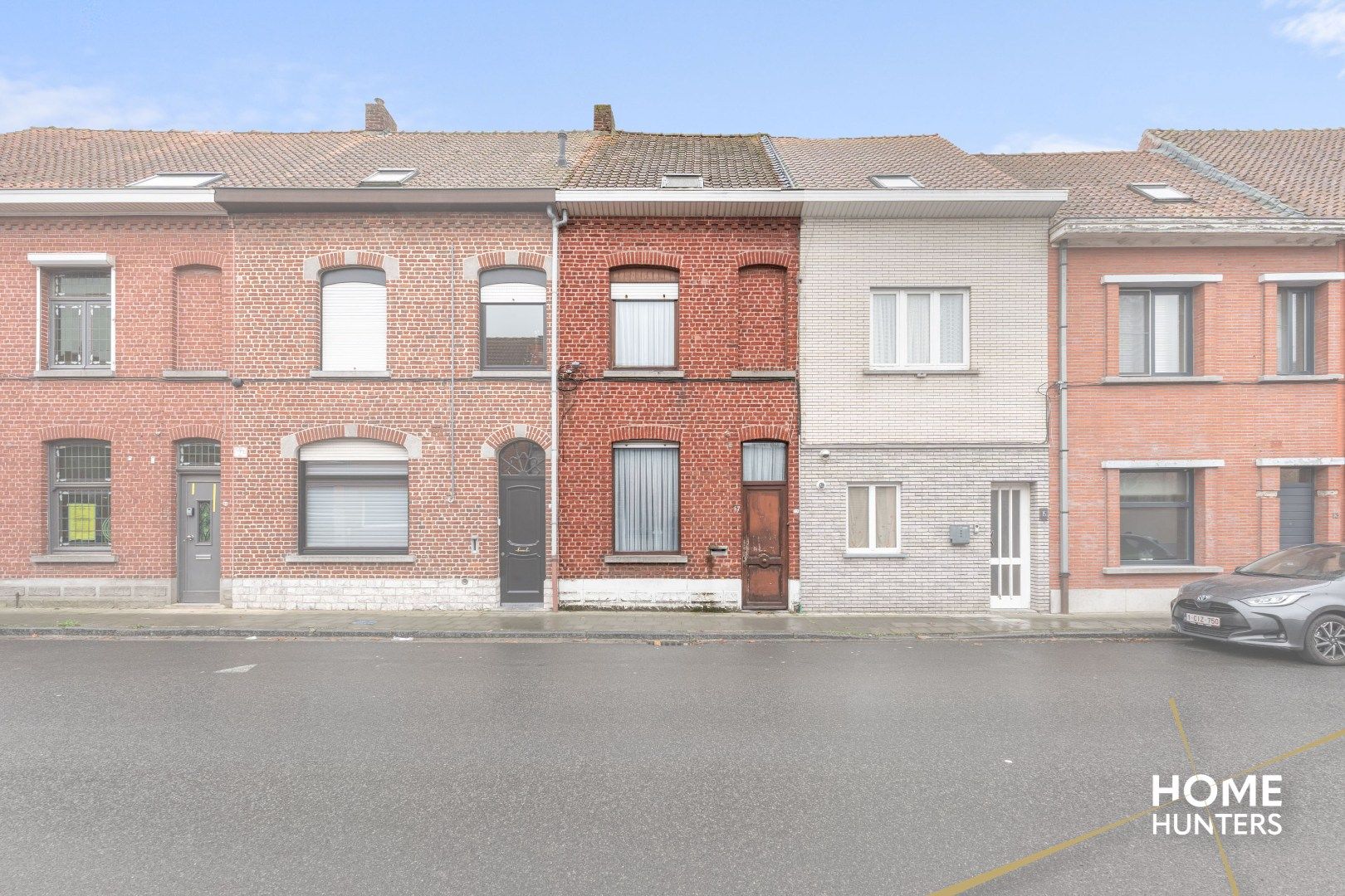 Charmante te renoveren rijwoning met 3 slaapkamers en diepe tuin op centrale ligging in Menen foto 28