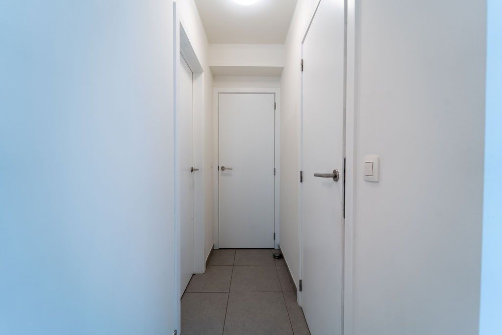 GUNSTIG GELEGEN 2 SLAAPKAMER APPARTEMENT 94 M² MET ONDERGRONDSE AUTOSTANDPLAATS EN KELDERBERGING IN HET CENTRUM VAN ZOLDER foto 13