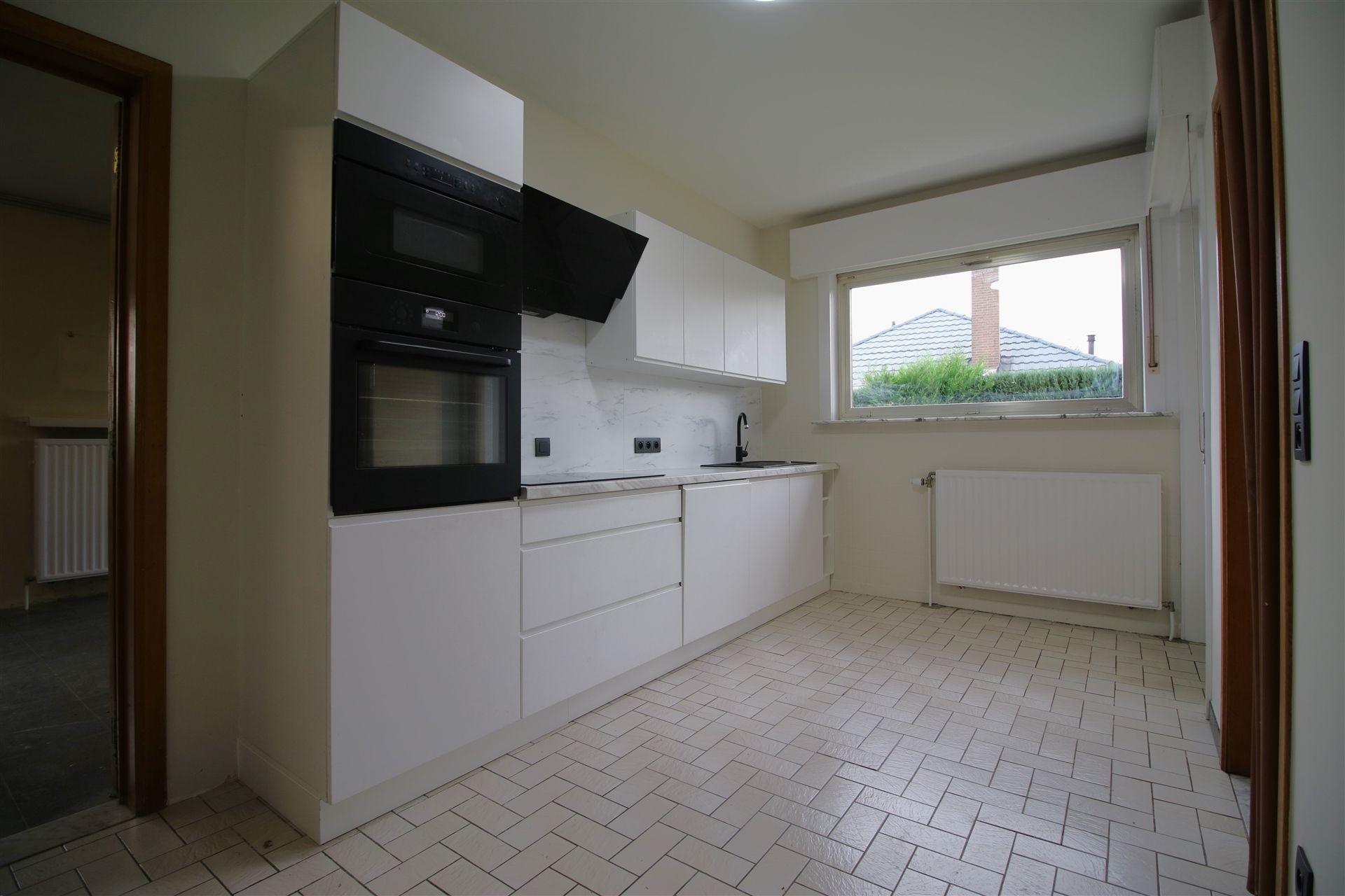 Ruime woning 4 slpk, garage en tuin foto 7