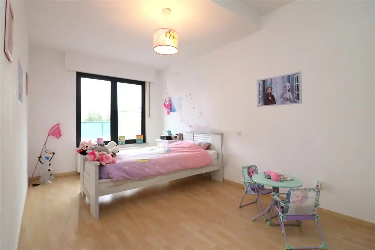 Ruim gelijkvloers wonen met tuin én rendement. foto 23