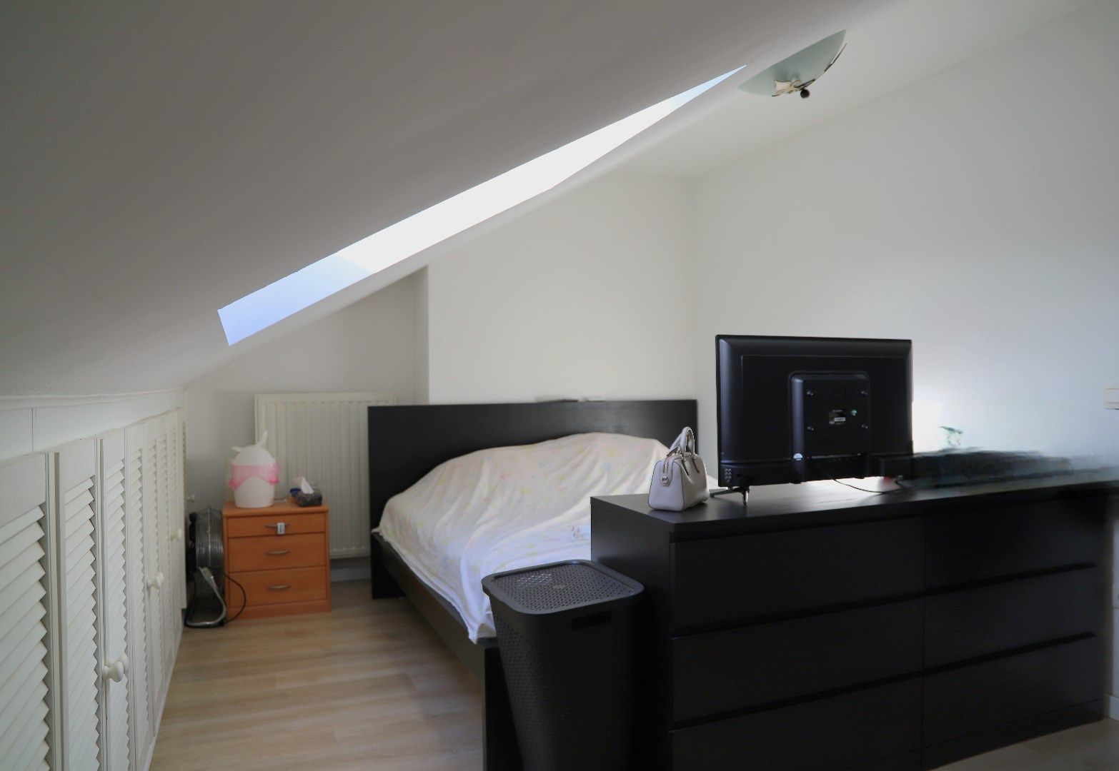 Ruim en licht duplex-appartement met 2 slaapkamers en autostaanplaats te Lanaken foto 13