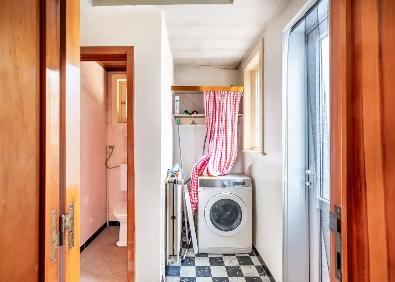 Te renoveren woning met zonnige stadstuin en veel potentieel foto 9