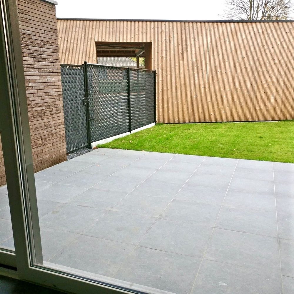 Modern gelijkvloers appartement met terras en tuintje in Opitter foto 9