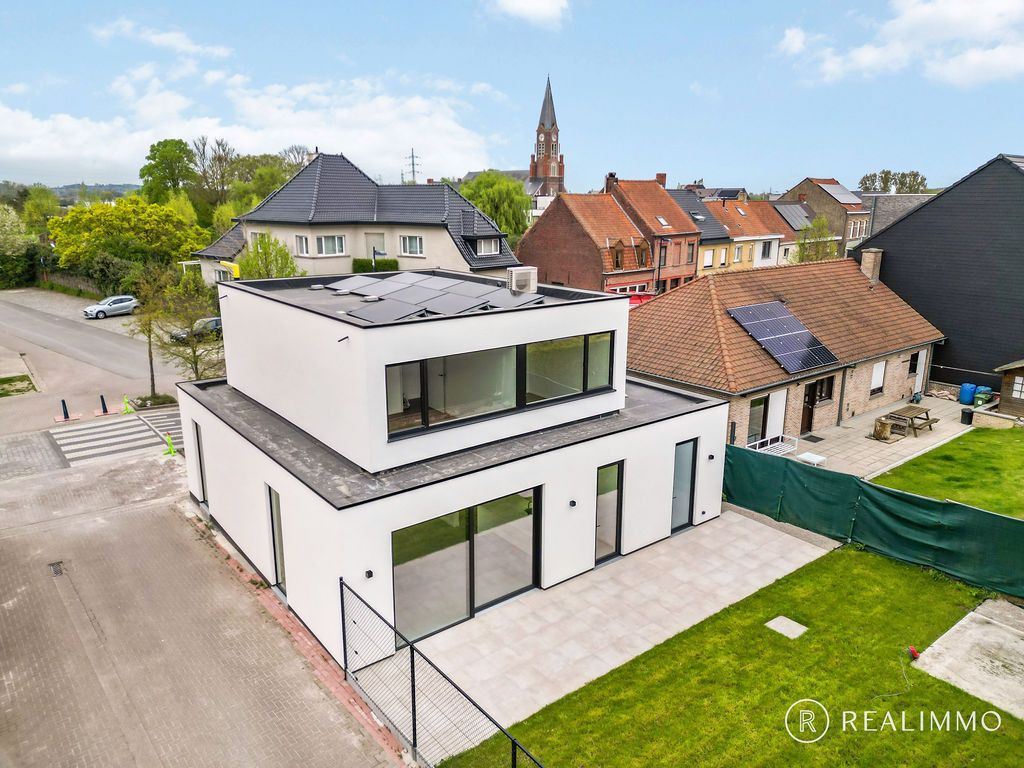 Ruime, moderne nieuwbouwwoning in hartje Ruien foto {{pictureIndex}}