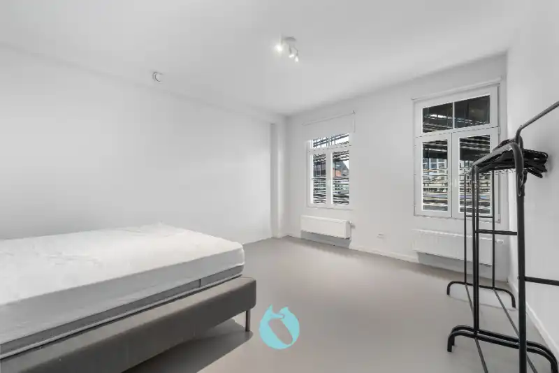 Instapklare stadswoning met 2 slaapkamers, bureauruimte en tuin foto 11