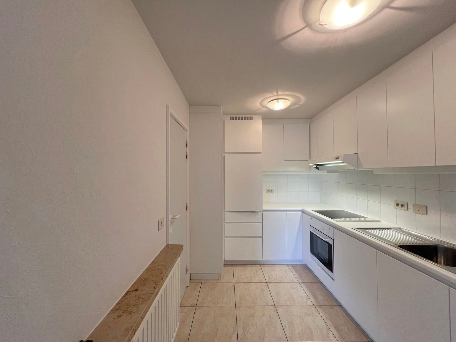 Ruim appartement met 2 slaapkamers, terras en garage foto 9