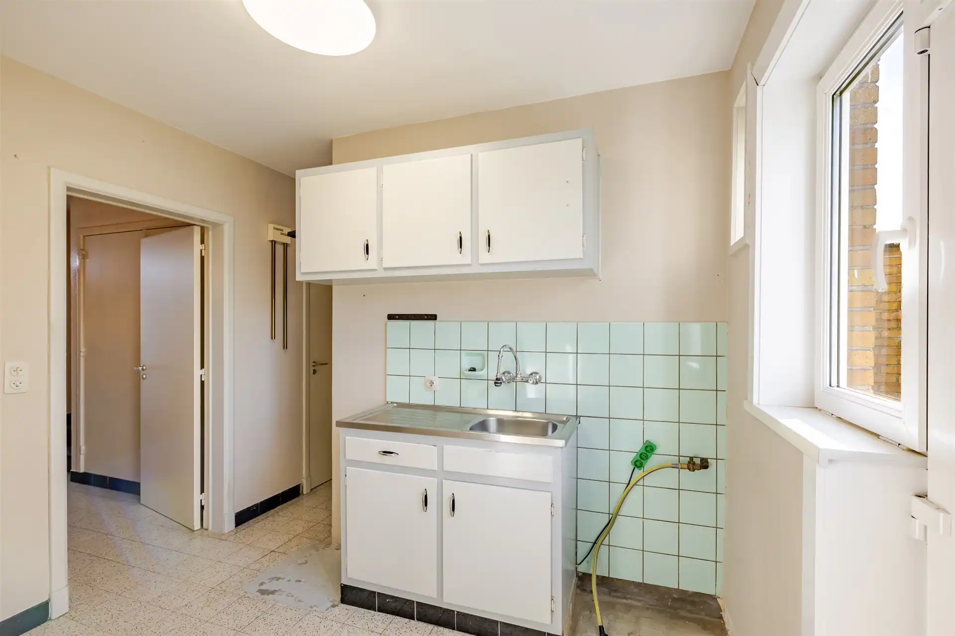 Te renoveren woning met 4 slpk en tuin foto 6