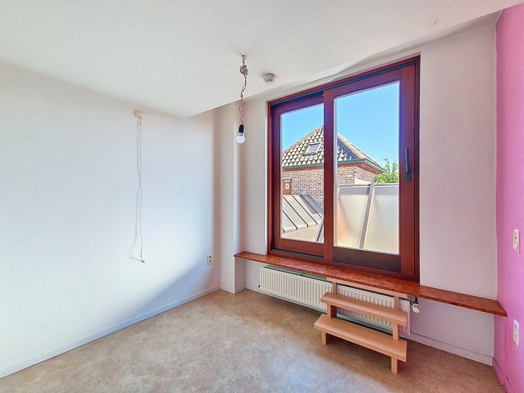 Ruime en energiezuinige wooneenheid met tuin foto 10