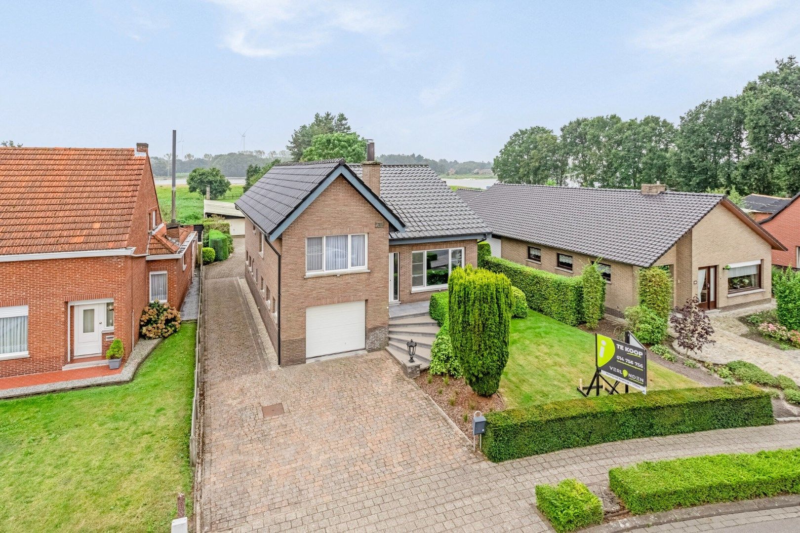 Woning met 4 slpks en zuid gerichte tuin, rustig gelegen te Witgoor (Dessel) ! foto {{pictureIndex}}