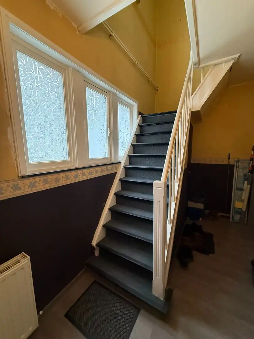 Opbrengsteigendom bestaande uit 2 halfopen woningen met garage en tuin te Hechtel. foto 11