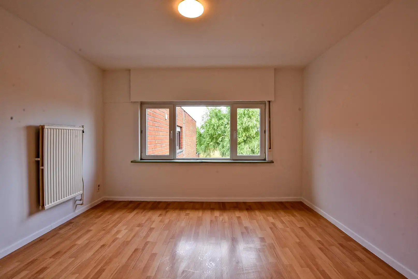 Halfopen bebouwing met mogelijkheid tot 7 slaapkamers, 2 badkamers en grote tuin in Aalter foto 15