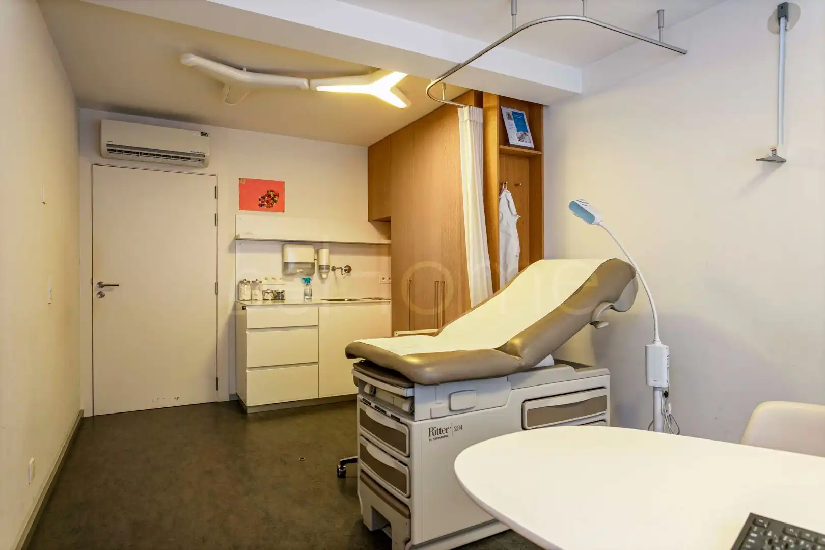 Exclusieve praktijkruimte met drie consultatieruimtes in het centrum van Merchtem foto 9