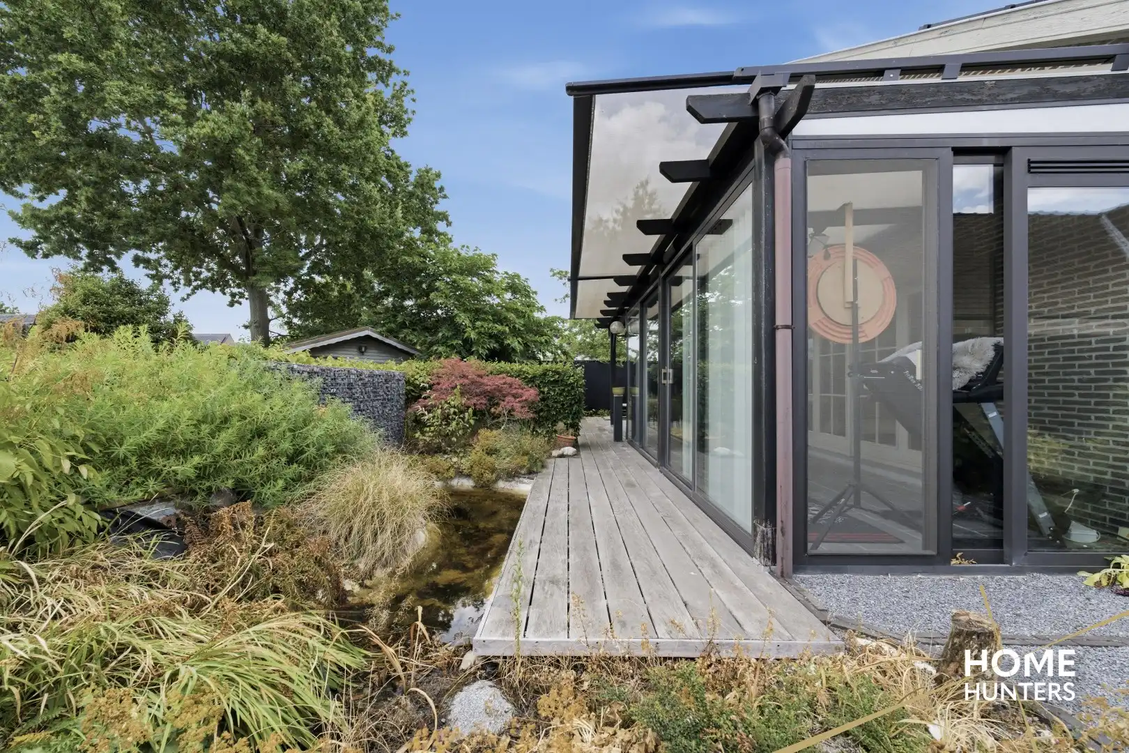 Alleenstaande woning met prachtige tuin en tal van extra troeven in een rustige wijk te Wervik foto 12