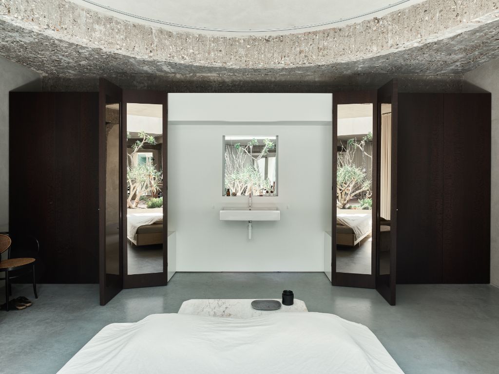 Uniqum - Architectuur tot op haar essentie. Een bijzonder doordacht brutalistisch appartement met tuin op een gegeerde locatie nabij het Sint-Pietersstation. foto 6