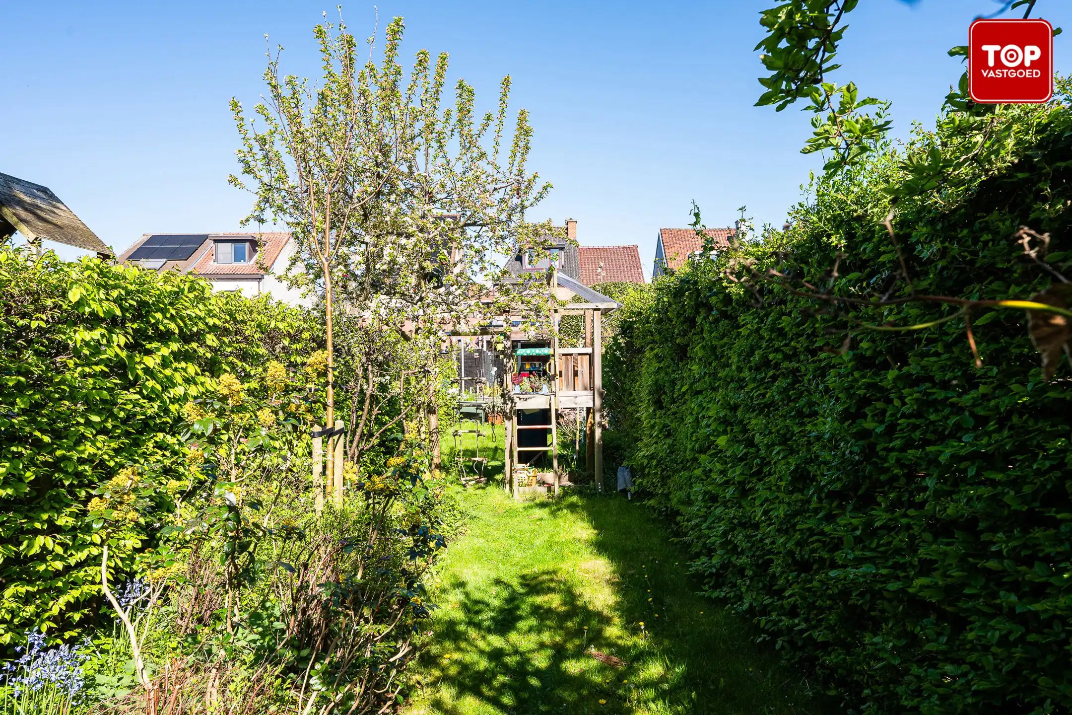 Instapklare woning met 4 slaapkamers, garage en prachtige tuin.  foto 13
