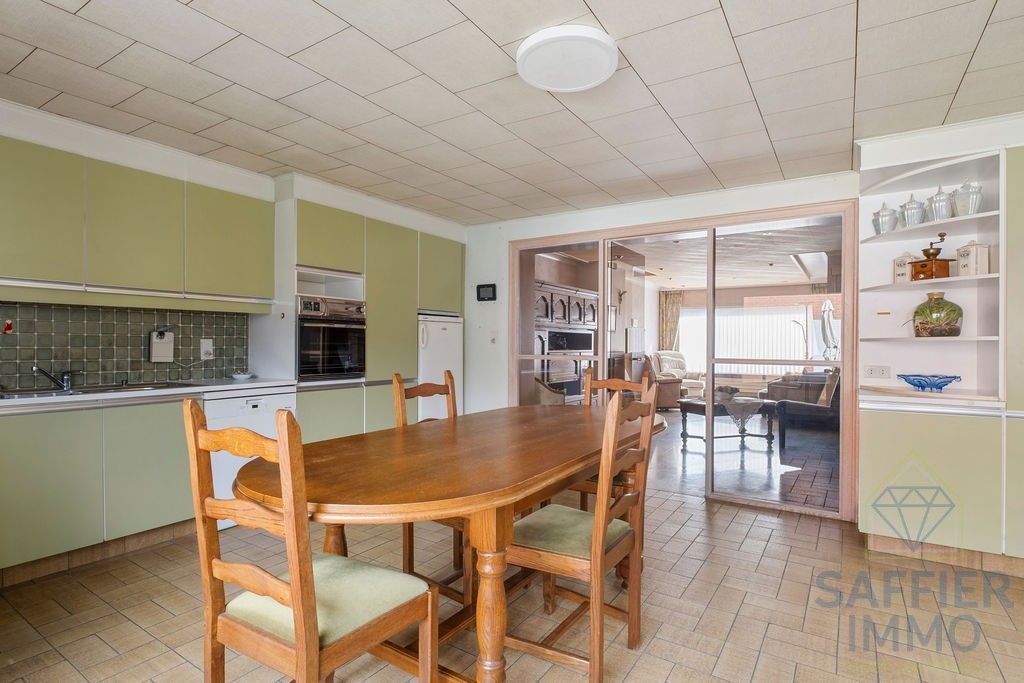 Ruime woning zonder renovatieplicht in de Seizoenswijk te Kuurne foto 17