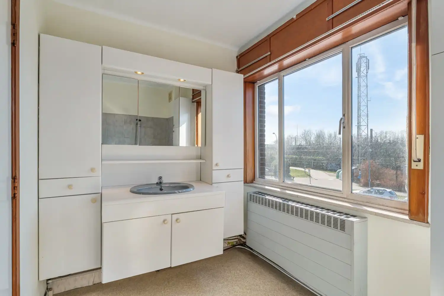 Goed gelegen en half open woning met 3 ruime slaapkamers, een extra leefruimte, een garage en een tuin te Kessel-Lo! foto 15