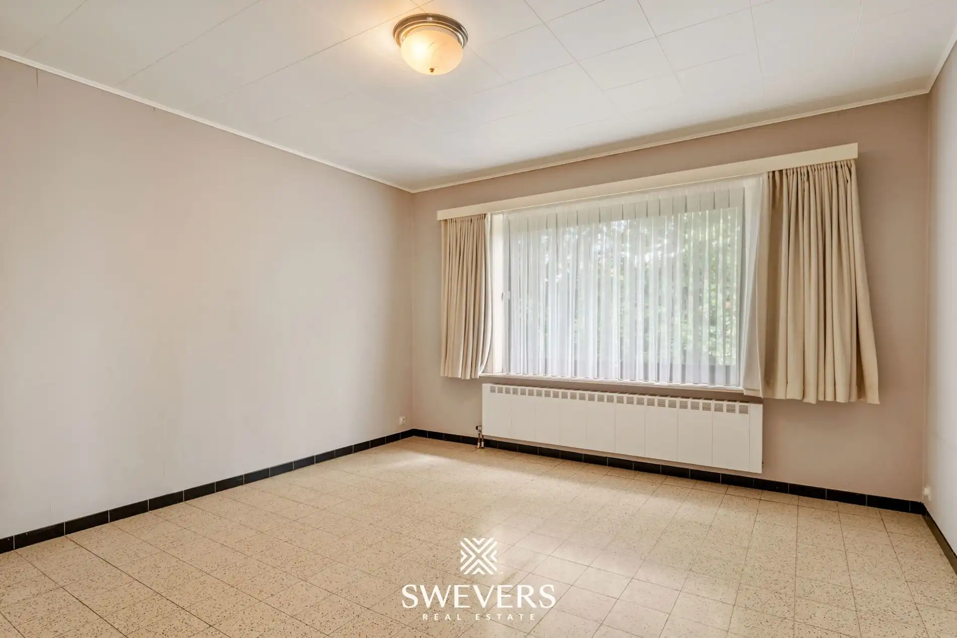 Centraal gelegen drieslaapkamer appartement foto 9