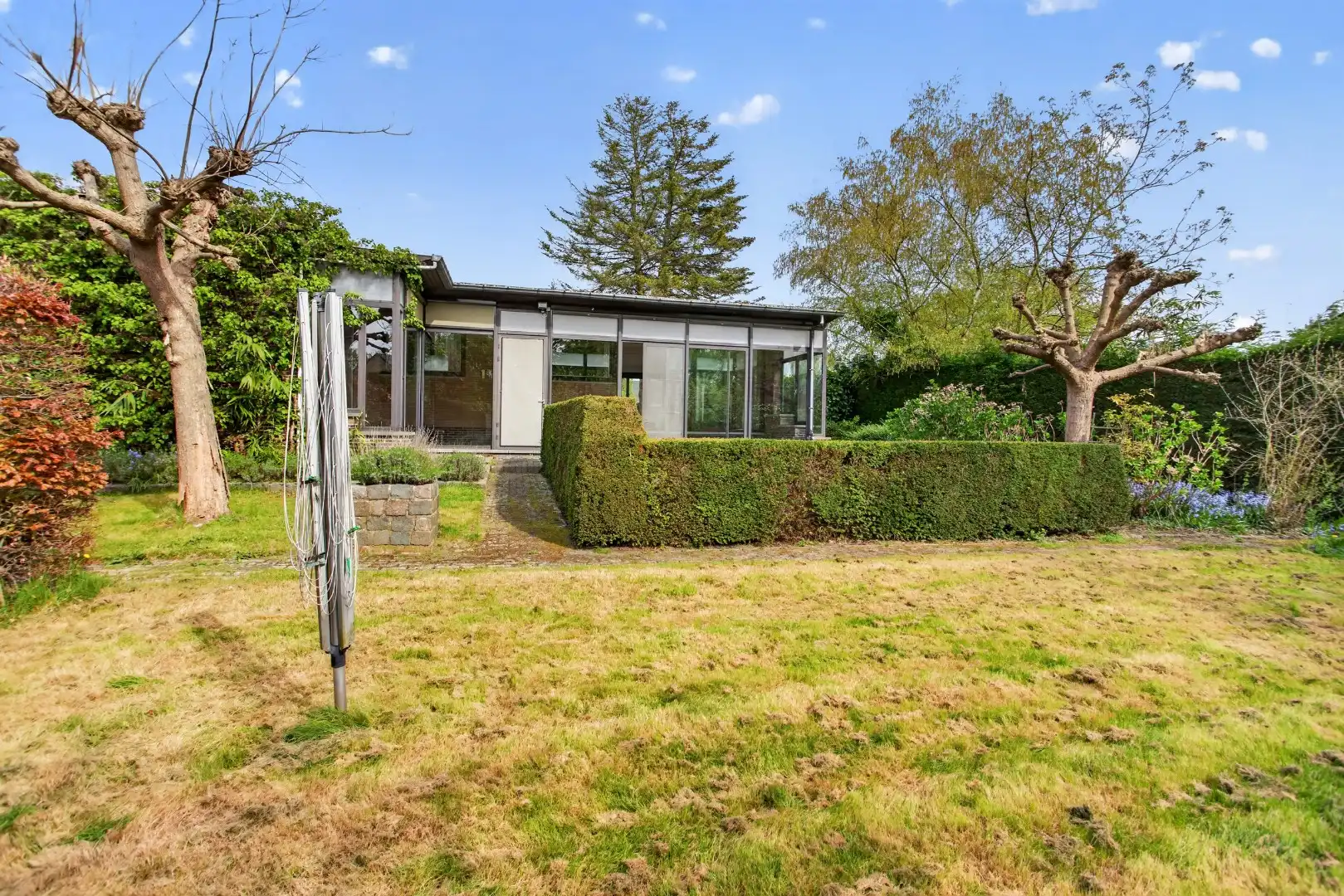 Ruime gelijkvloerse woning met veel potentieel op rustige ligging in Mol foto 43