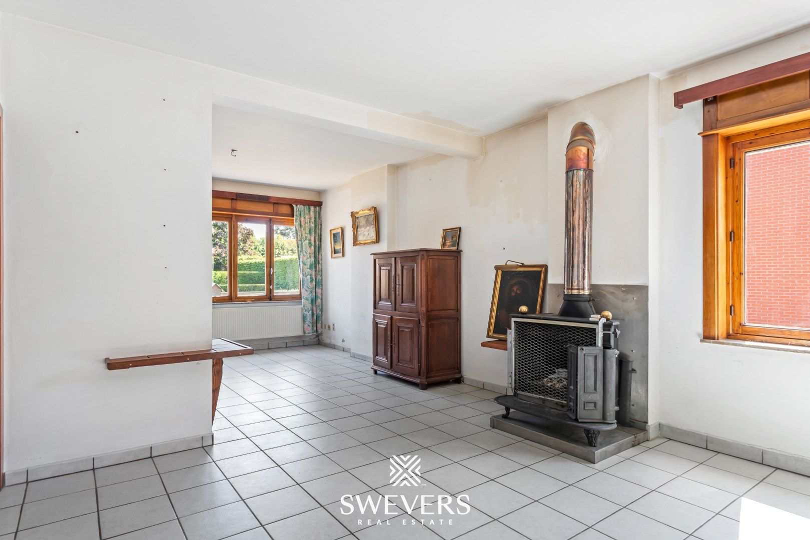Te renoveren open bebouwing met garage en tuin foto 4