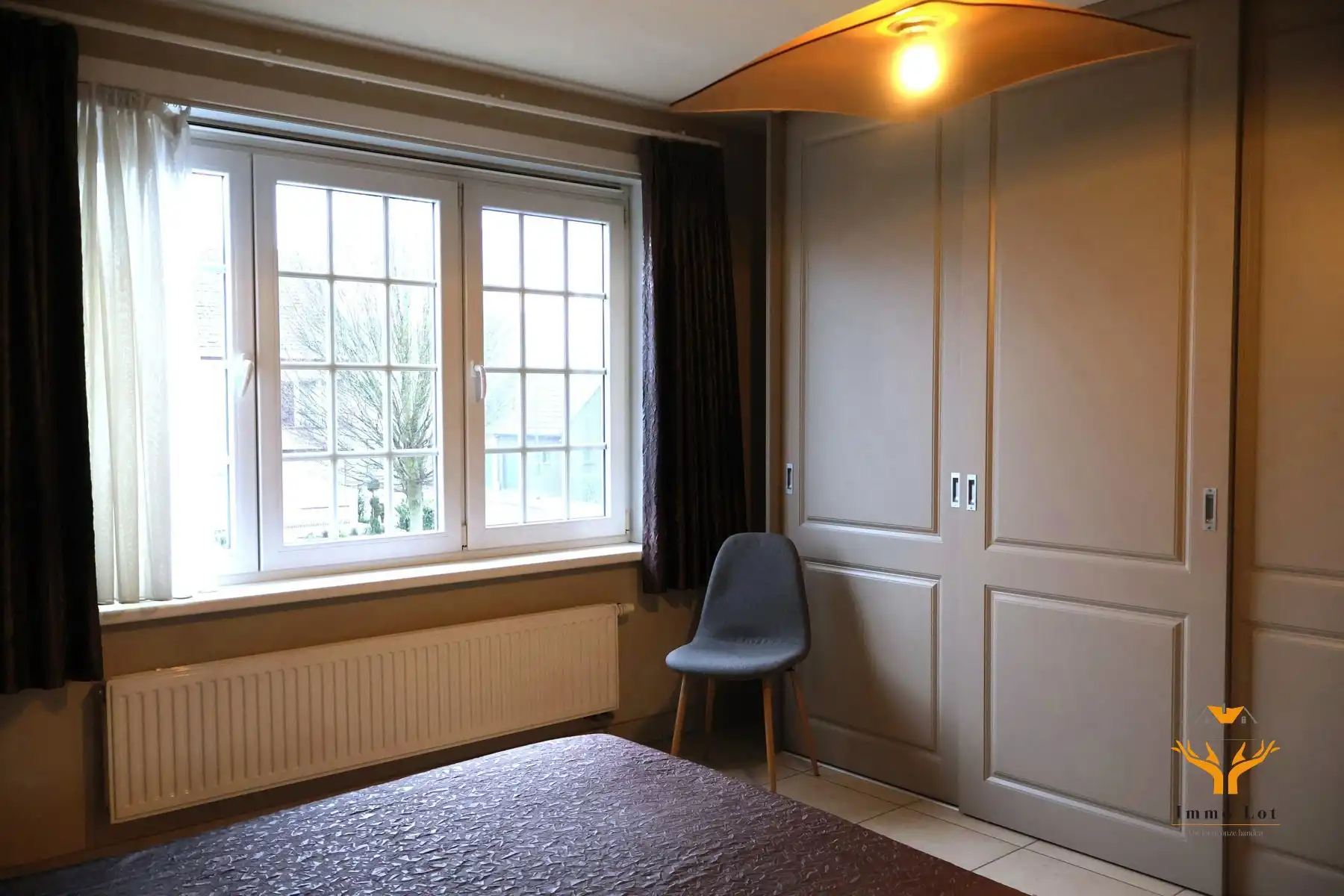 Gezellig appartement met terras en garage - huurprijs inclusief verwarming en water foto 10